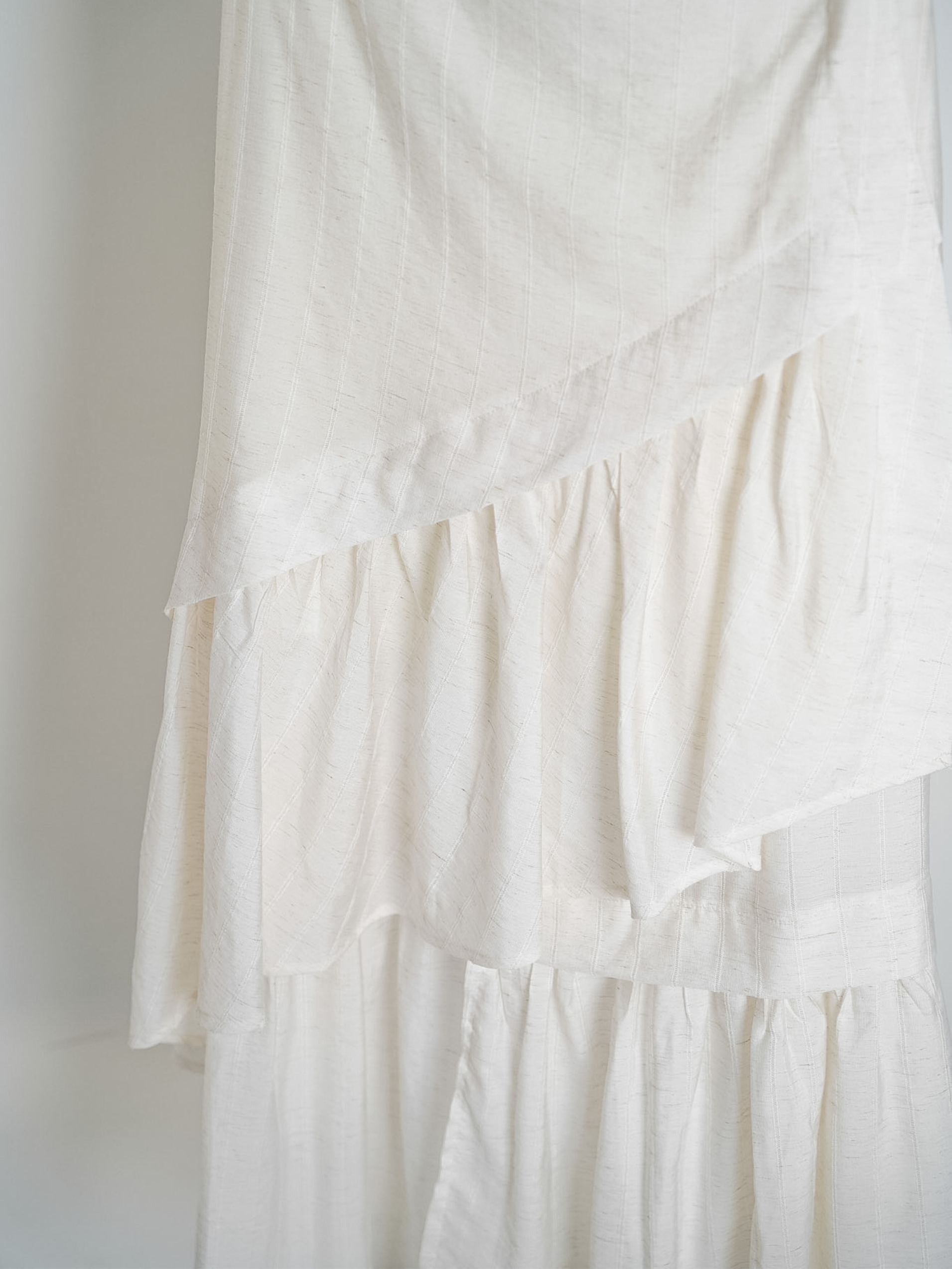 ASYMMETRY FRILL HEM SKIRT