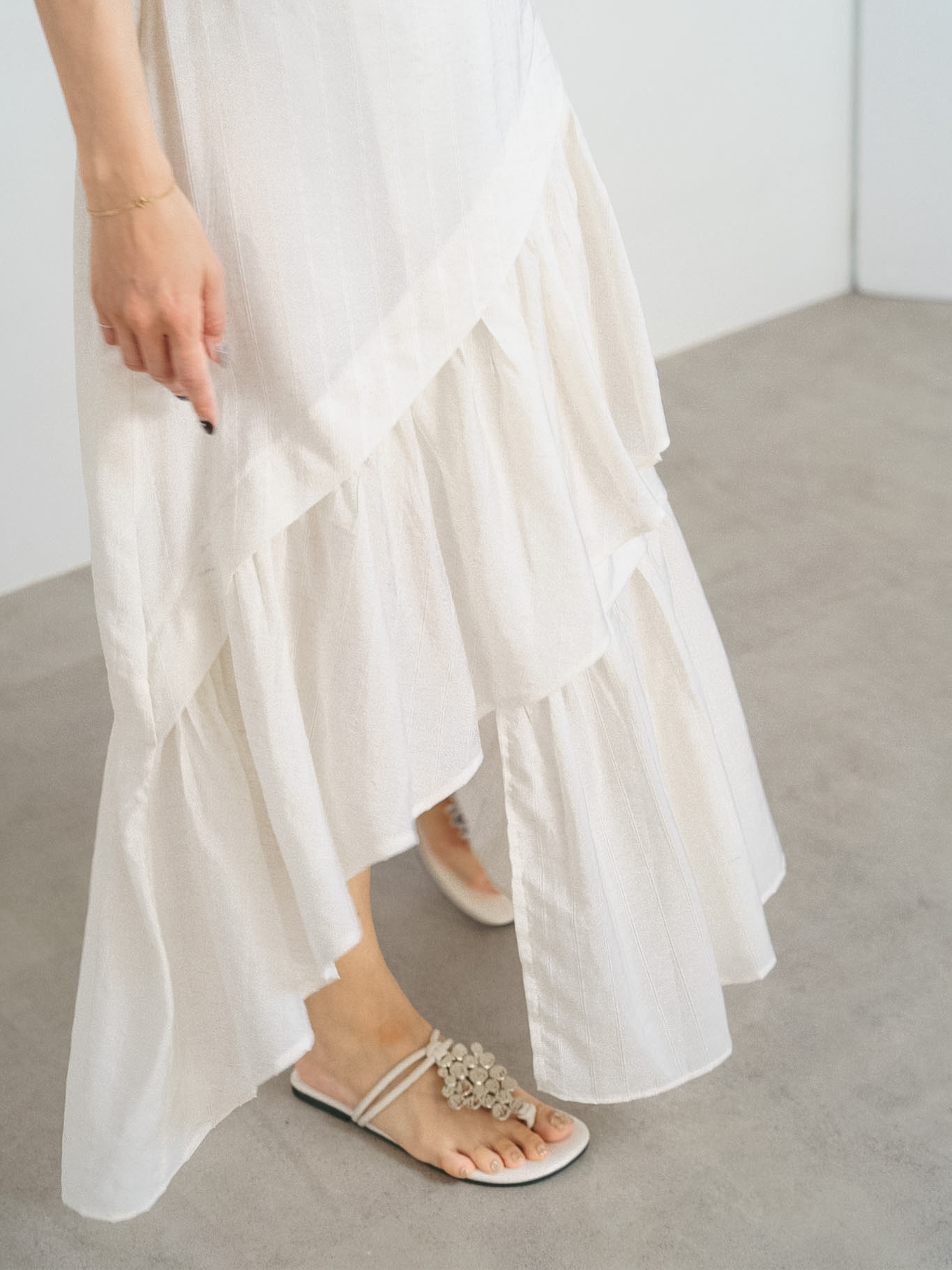 ASYMMETRY FRILL HEM SKIRT